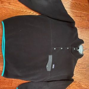 Men’s black Patagonia sweater. Size M
